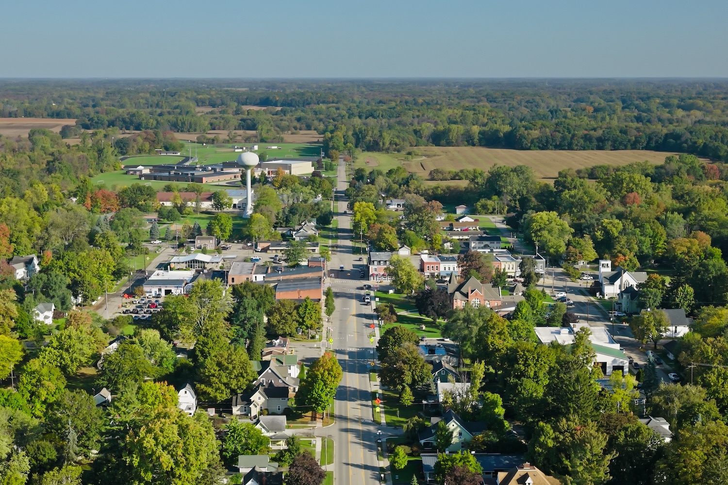A aerial shot of a rural town, representing the communities that often fall below the cyber poverty line.